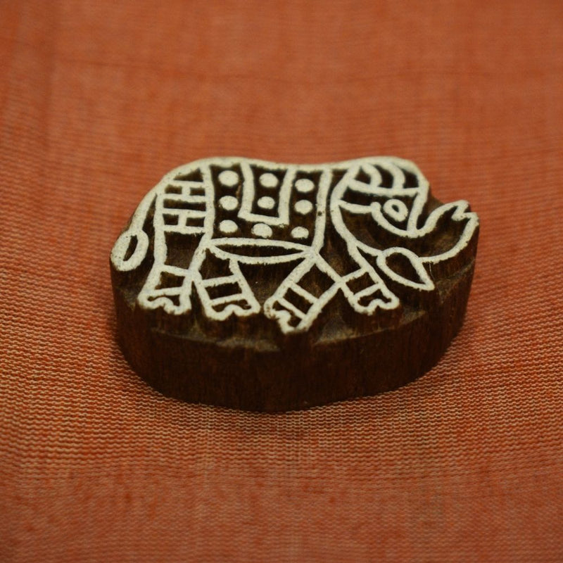 Hand carved block fridge magnet - baby elephant design
